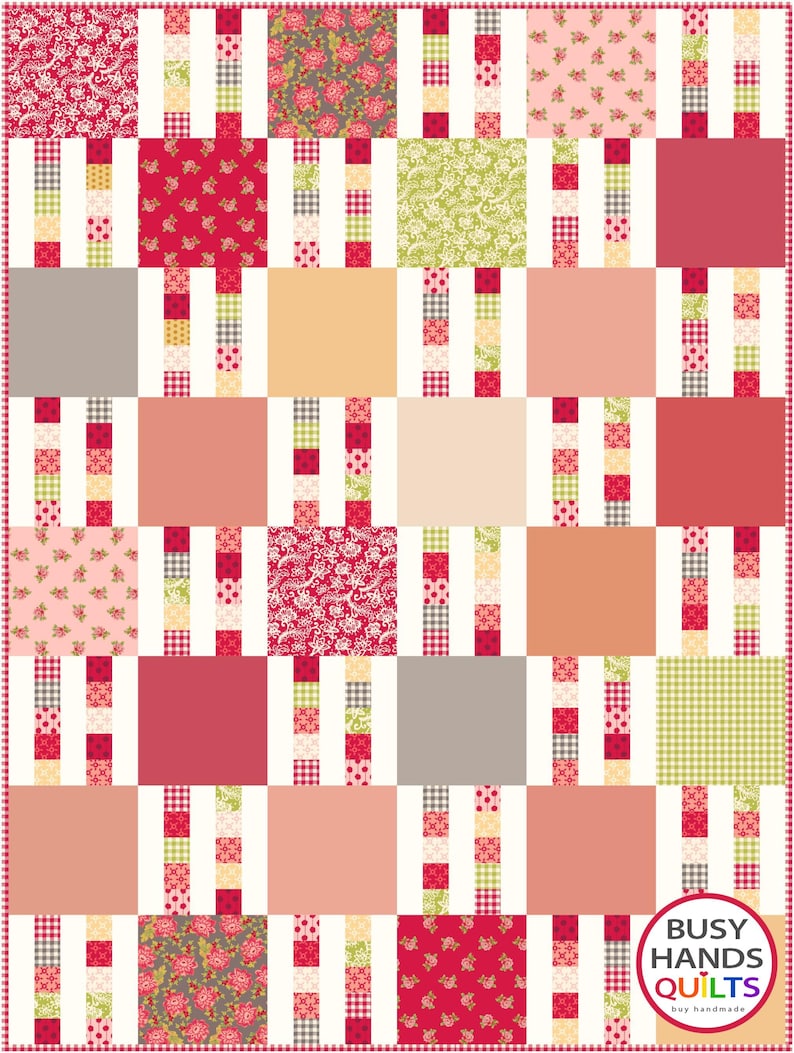 May include: A patchwork quilt with a white background and squares of various colors and patterns, including red, pink, orange, green, and floral prints. The quilt is made up of 9 rows of 9 squares. The quilt is labeled "Busy Hands Quilts" in the bottom right corner.