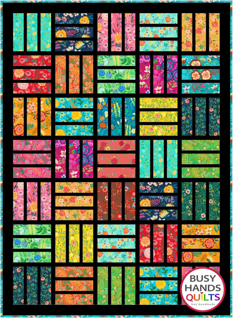May include: A colorful quilt with a black grid pattern and floral fabric squares. The quilt is made by Busy Hands Quilts.