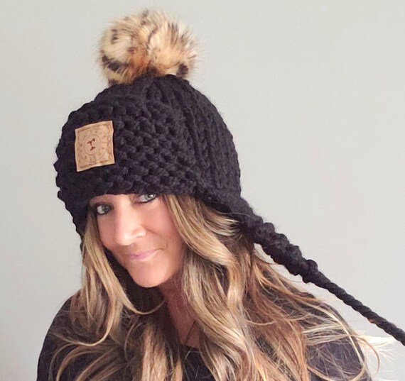 earflap pom pom hat
