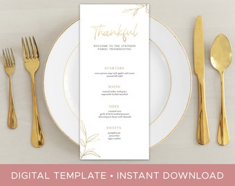May include: A printable Thanksgiving menu template with a gold leaf design. The menu includes a list of starters, mains, sides, and sweets. The text "Thankful" is written in gold script at the top of the menu.