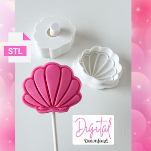 May include: A pink seashell-shaped confection on a stick, next to two white seashell-shaped cookie cutters. The image includes the text "STL" and "Digital Download".