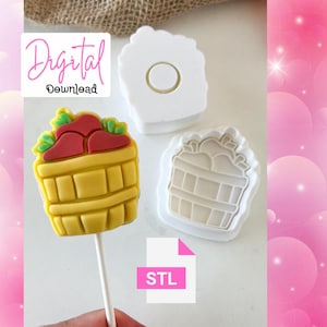 May include: A yellow cake pop shaped like a basket filled with red strawberries and green leaves, on a white stick. Two white plastic molds are next to the cake pop. The words "Digital Download" and "STL" are also visible.
