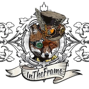 May include: Illustration of a fox wearing a steampunk top hat and goggles, set within an ornate, floral frame. The fox has brown fur, with one green and one orange eye. A banner below reads "InTheFrame".
