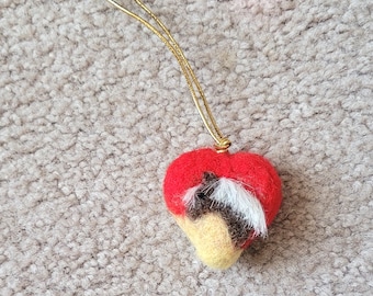 A needle felted heart made from your pet fur/hair. Memory forever. Any size/design.