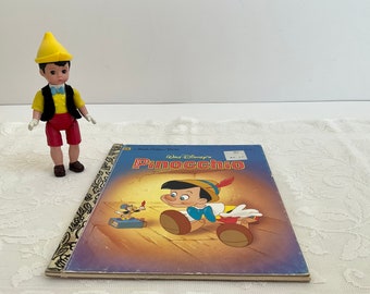 Vintage set of Pinocchio Little Golden Book and Pinocchio doll