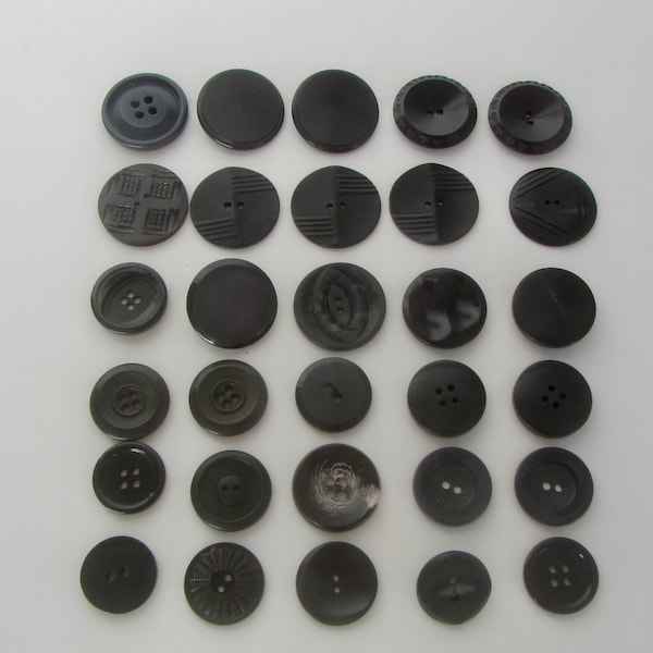 Vintage 30 Big black round two and four holes and shank buttons