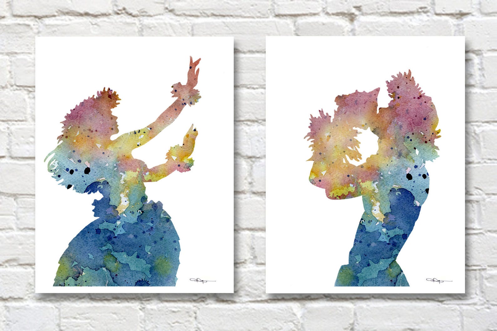 Wall art of hula girl dancer and male dancer
