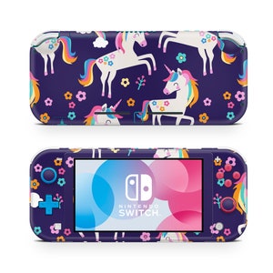 May include: A purple Nintendo Switch Lite console with a unicorn and flower pattern. The console has a white screen with the Nintendo Switch logo and text.
