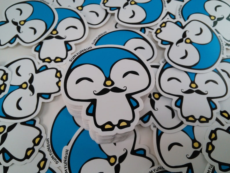 May include: A stack of blue and white penguin stickers with a mustache and a happy expression. The stickers have the text "SUMYUNGUH" on them.