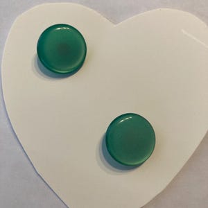 Set of two green shank buttons