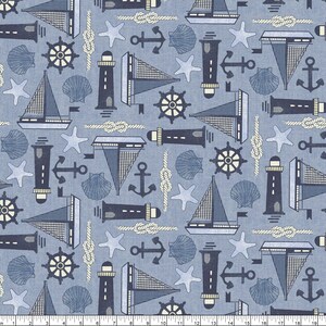 May include: A blue and white nautical themed fabric with repeating patterns of lighthouses, sailboats, anchors, stars, seashells, and steering wheels.