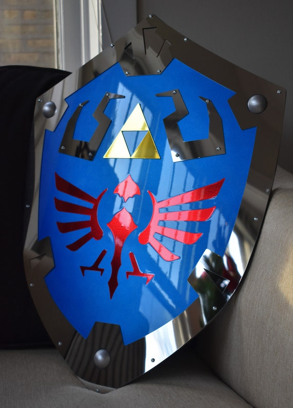 27 Blue Hylian Shield with wall hanger and sheath from The Legend of – HS  Blades Enterprise