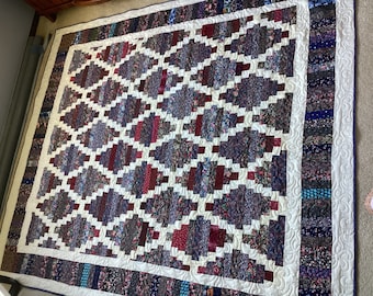 Queensize quilt met mozaïekmotief