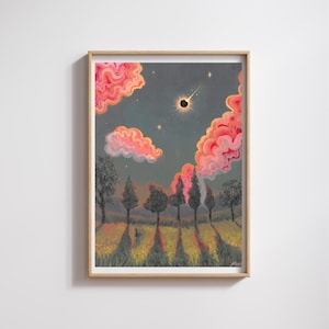 May include: A framed art print depicting a landscape with a dark grey sky, a solar eclipse, and vibrant pink, swirling clouds. Below, a field of yellow flowers features several dark green trees casting long, distinct shadows across the ground.