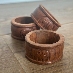 May include: A set of three ceramic mugs with a speckled, matte finish. The mugs are in shades of cream, light gray, and dark gray. Each mug has a simple, minimalist design, perfect for coffee or tea.