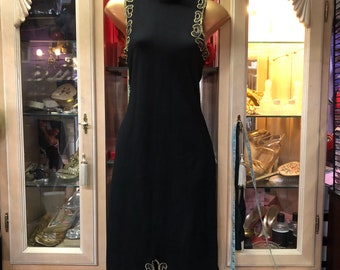 WOW! An oriental inspired black sleeveless full length shift dress with ornate gold embroidery around the high neck, arms and hem