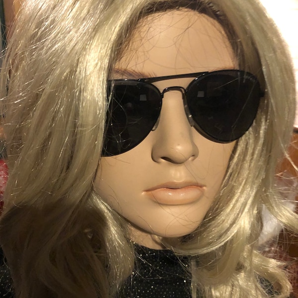 Retro 1980s Espirit Aviator style black metal  sunglasses with grey green tinted lenses. Fashion shoot retro lover