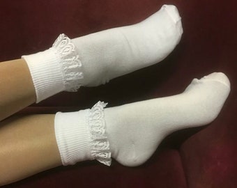 Cute cotton ankle socks with lace trim. Perfect pinup or goth accessory, available in white or black