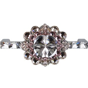 May include: A silver drawer pull with a large crystal centre surrounded by smaller pink and clear crystals.