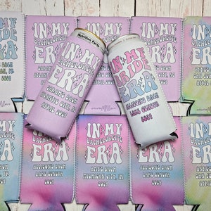 May include: A set of 10 colorful can coolers with the text "In My Bachelorette Era" and various dates and locations. The can coolers are decorated with stars and a tie-dye pattern.