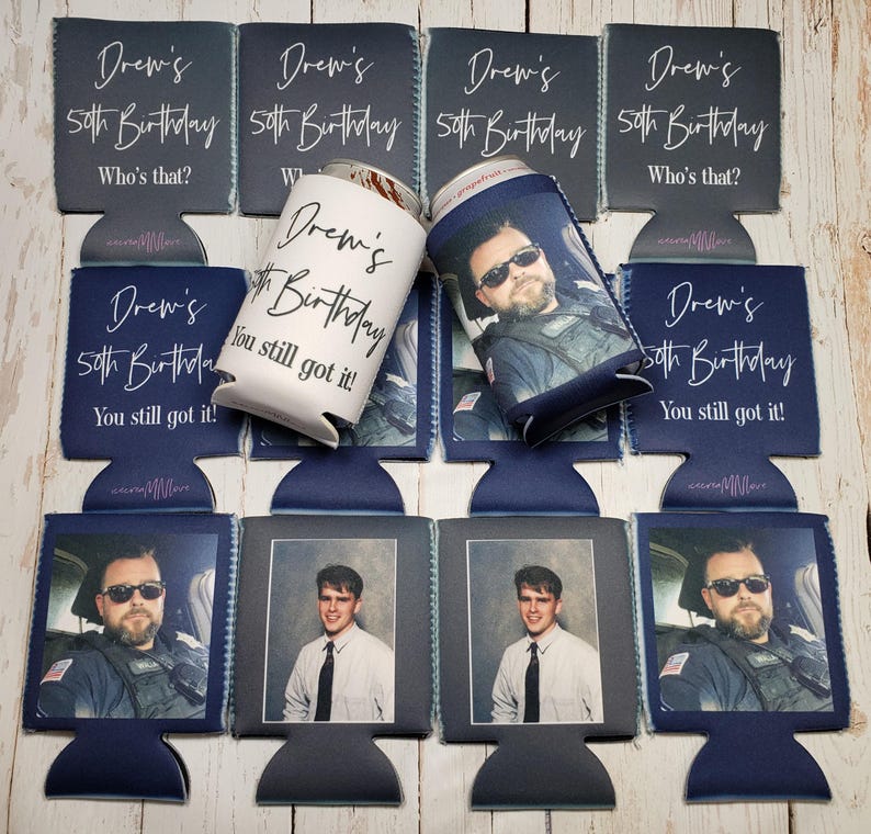 May include: Navy blue and white can coolers with the text "Drew's 50th Birthday" and photos. Some coolers have the phrases "Who's that?" and "You still got it!" printed on them. The image features a variety of designs.
