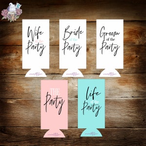 May include: Set of six white can coolers with black text. The coolers feature the phrases "Wife of the Party", "Bride of the Party", "Groom of the Party", "The Party", and "Life of the Party".