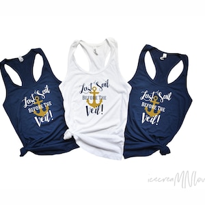 May include: Three tank tops with the text "Last Sail Before The Veil!" and an anchor graphic. The tank tops are in navy blue, white, and dark blue.