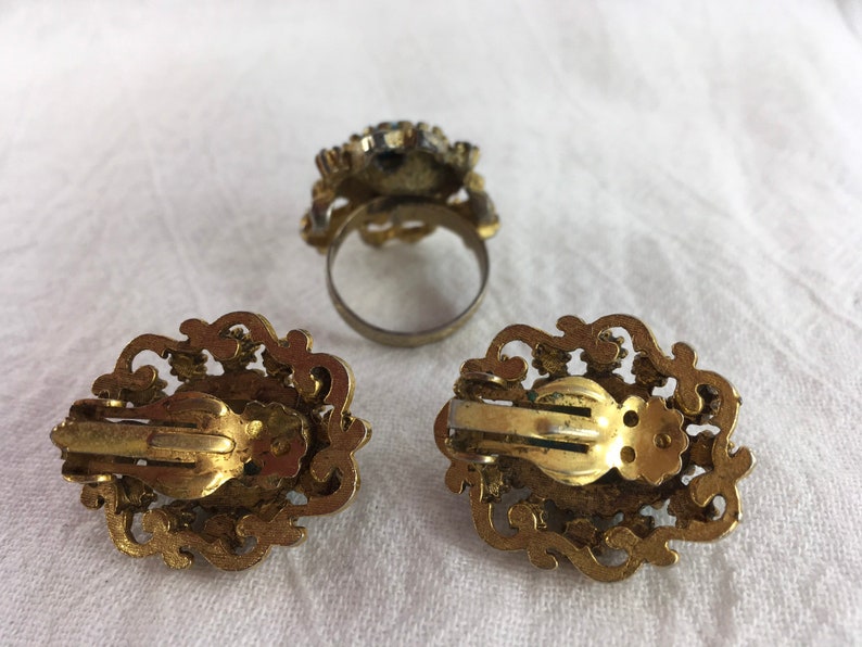 Stunning adjustable vintage ring and clip earring set!