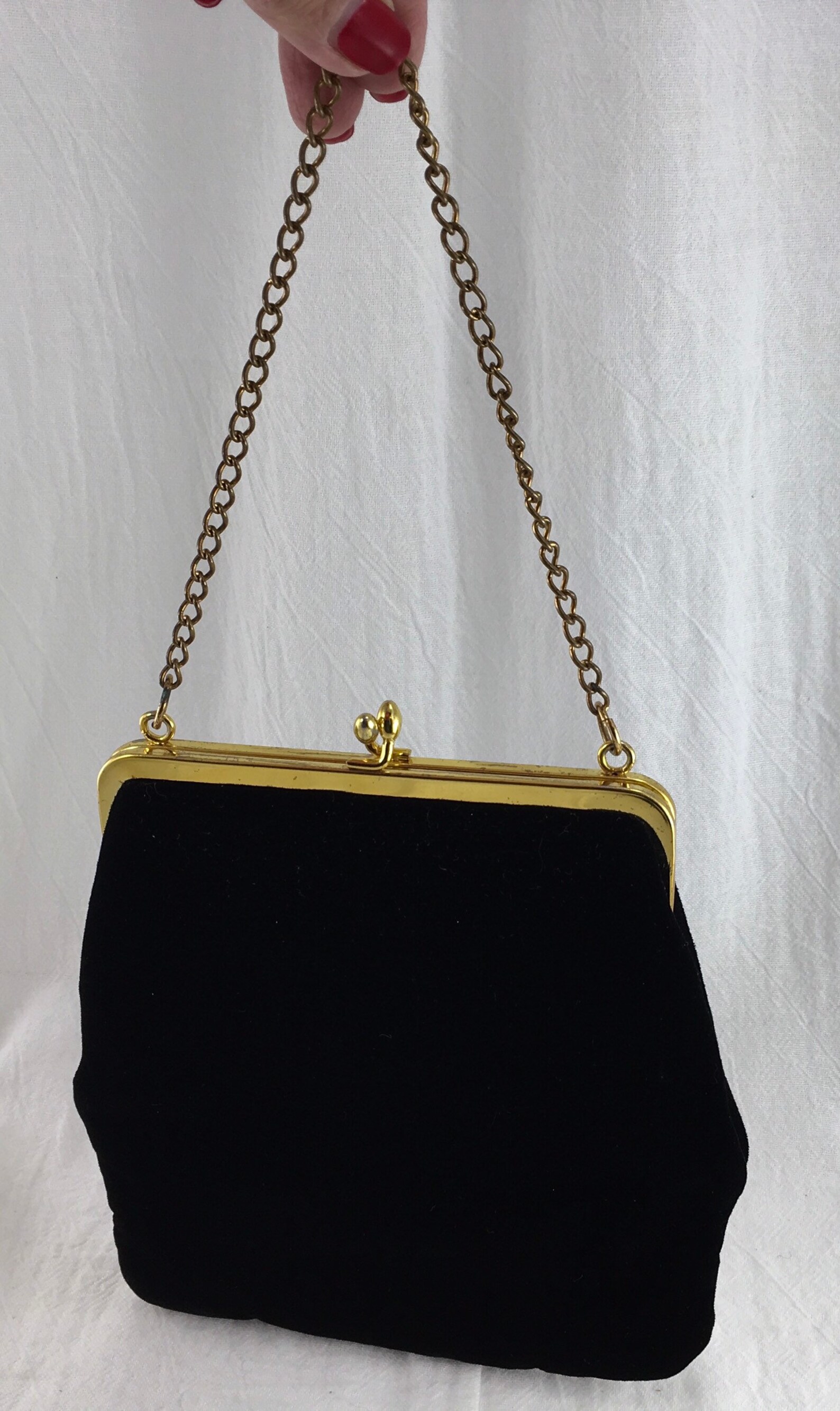 Black velvet evening bag with a golden chain handle by Etsy