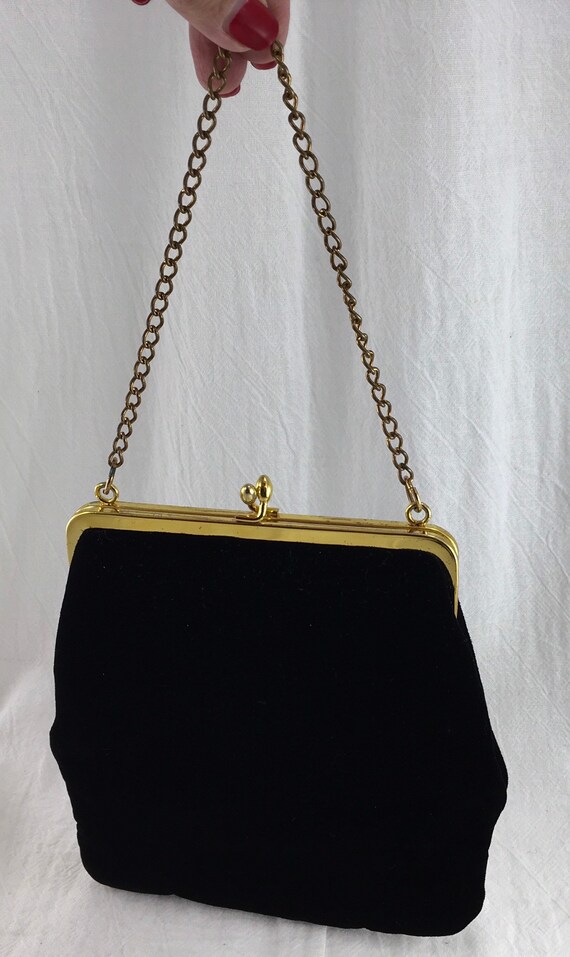 Black velvet evening bag with a golden chain handle by Etsy