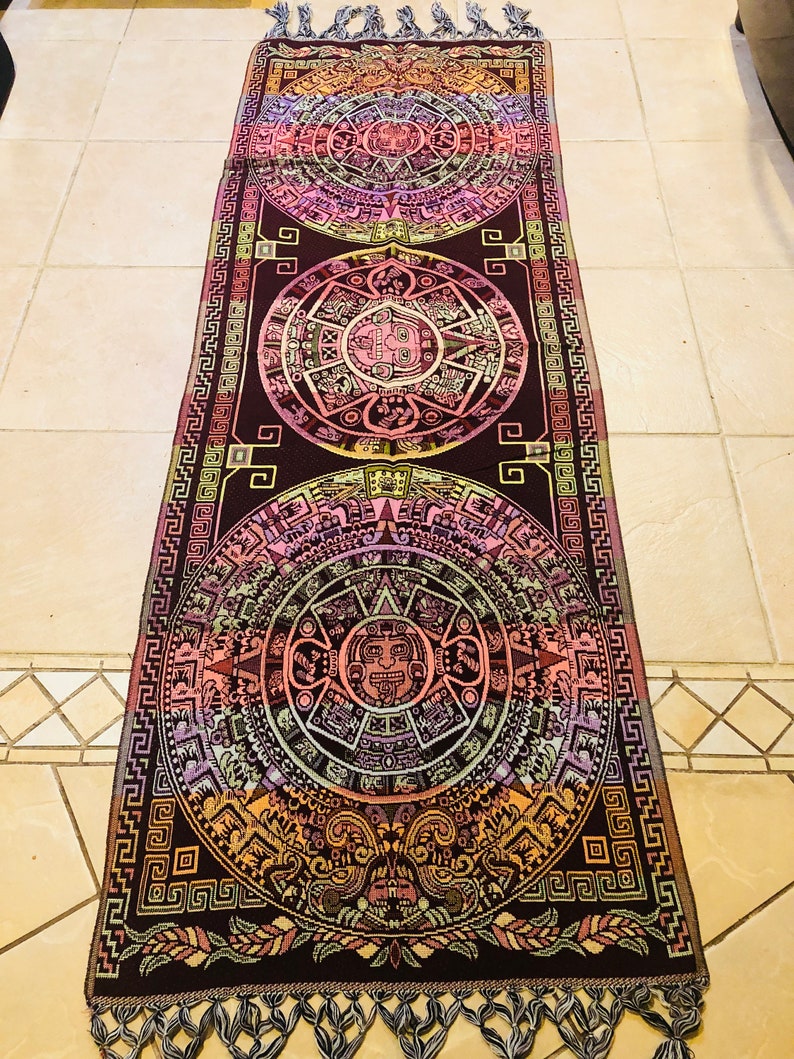 Center decorative table cloths with Aztec /& Mayan calendars.