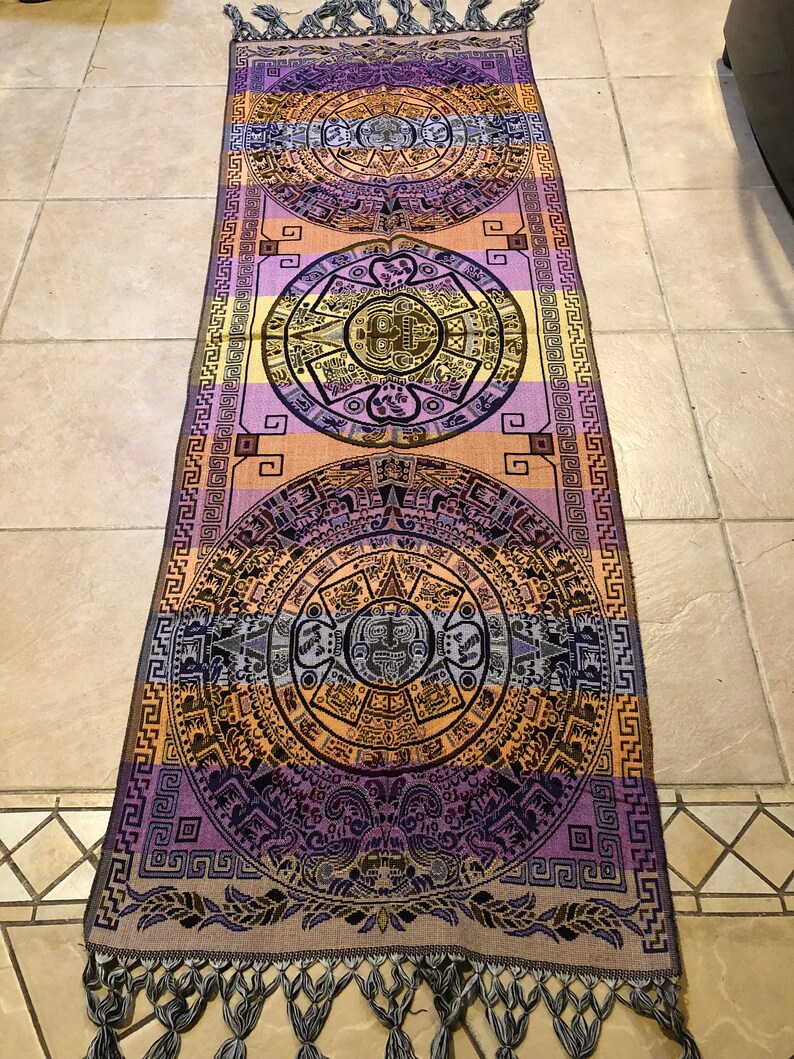 Center decorative table cloths with Aztec /& Mayan calendars.