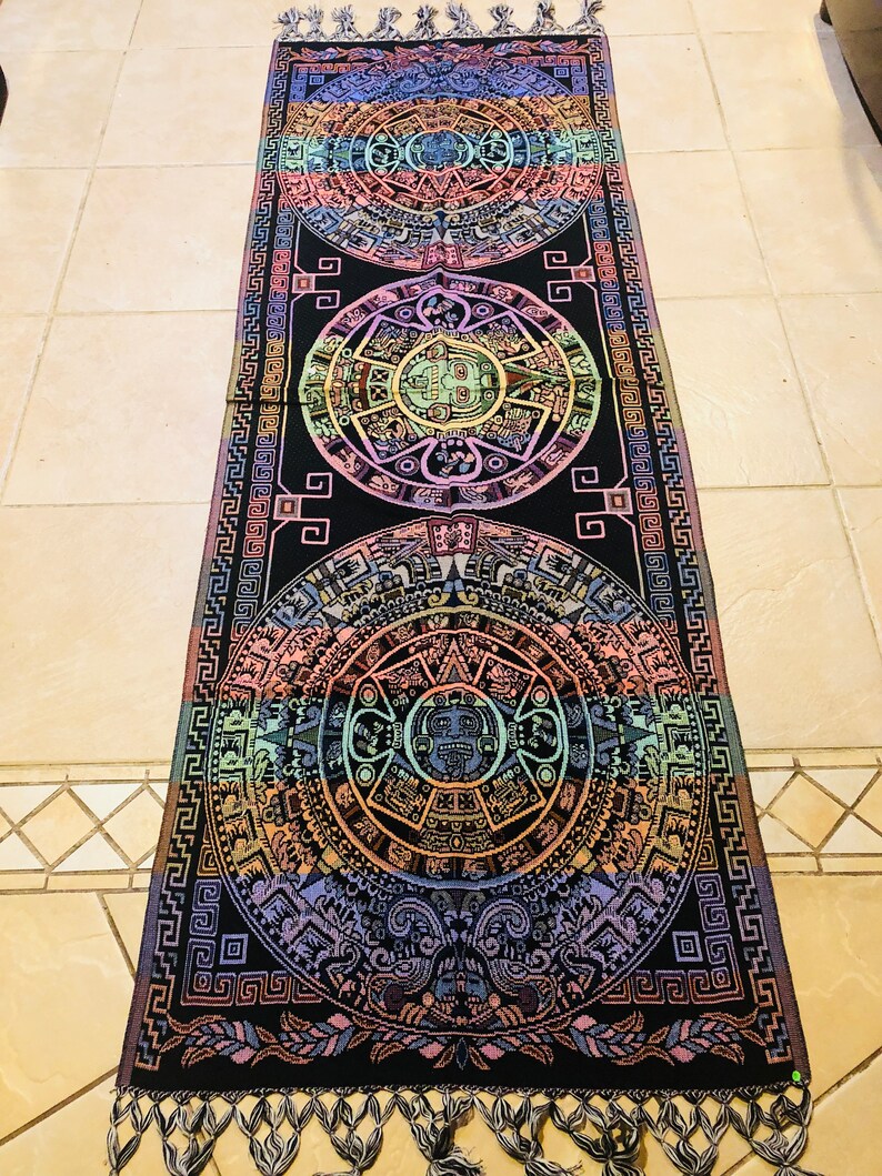 Center decorative table cloths with Aztec /& Mayan calendars.