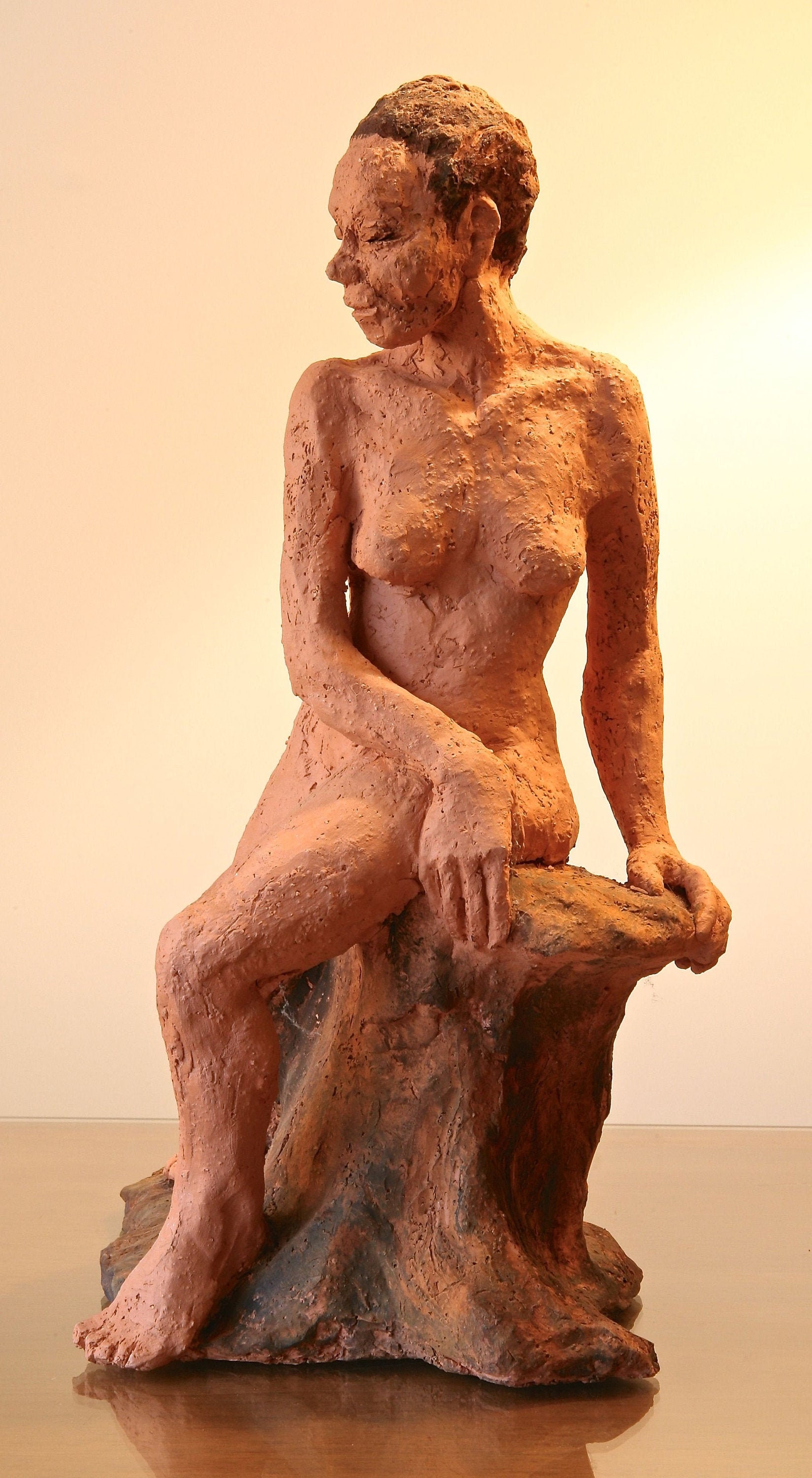 Red Clay Sculpture of a Seated Nude – Showplace
