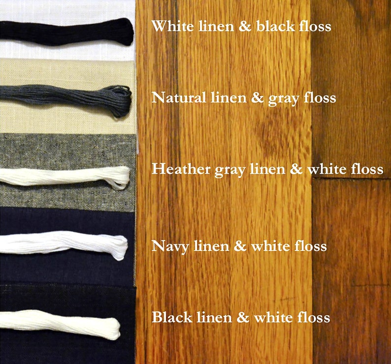May include: Five swatches of linen fabric paired with matching floss thread. The linen swatches are white, natural, heather gray, navy, and black. The floss thread is black, gray, white, white, and white.