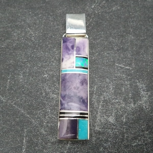 Handmade Sterling Silver Pendant with purple Burtronite, Turquoise, Onyx and man made Opal Inlay by Navajo Artist Kenneth Bitsie.