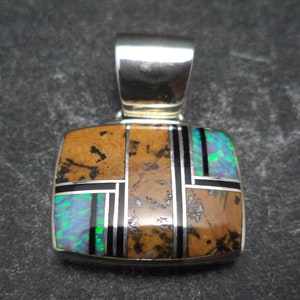 Handmade Sterling Silver Pendant with jasper, onyx and man made Opal Inlay by Navajo Artist Kenneth Bitsie.
