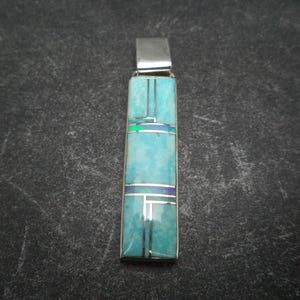 Handmade Sterling Silver Pendant with whitewater Turquoise and man made Opal Inlay by Navajo Artist Kenneth Bitsie.