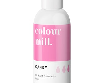 May include: A white bottle with a white cap and a pink label. The label reads "colour mill." and "CANDY" with three pink teardrop shapes. The bottle contains 100ml of oil-based food coloring.