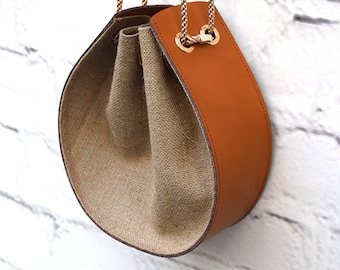 13 Moon Bags To Solve Your Minimalist Fix