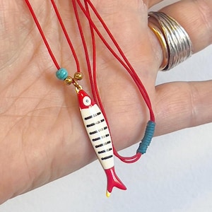 Bright red cord with adjustable length - Enamel sardine charm inspired by Portuguese coast - Tiny turquoise bead accent