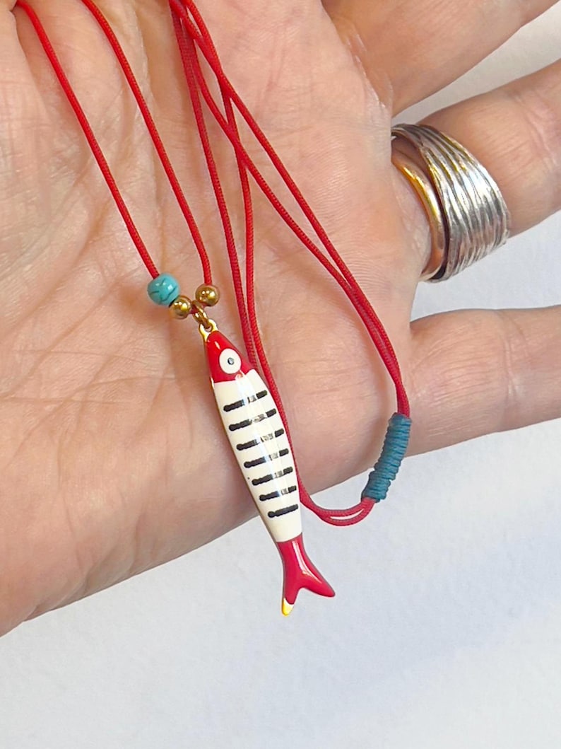 Bright red cord with adjustable length - Enamel sardine charm inspired by Portuguese coast - Tiny turquoise bead accent