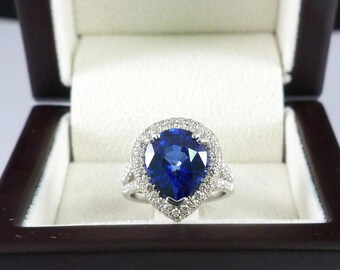 Elegant Pear-Cut Blue Sapphire Ring with Diamond