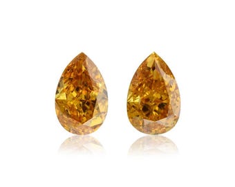 0.80 Carat Fancy Vivid Orange Pear Diamond VS1 GIA Certified