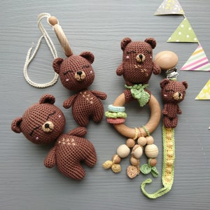 Bear themed baby gift set. Crochet toys bundle: pacifier clip, rattle, stuffed animal, hanging toy. Gender-neutral first birthday gift