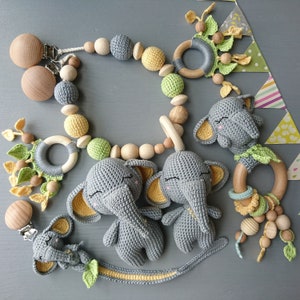 Elephant themed baby gift set. Crochet toys bundle pacifier clip, rattle, stuffed animal, stroller chain. Gender-neutral first birthday gift