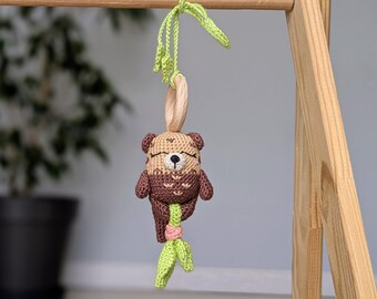 Hangende speelgoedrammelaar Otter: sensorisch babygymspeelgoed