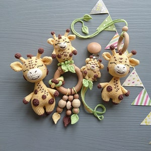 Giraffe themed baby gift set. Crochet toys bundle: pacifier clip, rattle, stuffed animal, hanging toy. Gender-neutral first birthday gift