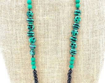 Green and black necklace-glass, wood, lava