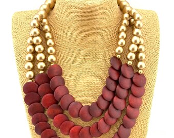 Red wood discs 3 strand statement necklace with gold wood